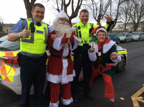 Santa bringing good wishes to the boys in blue